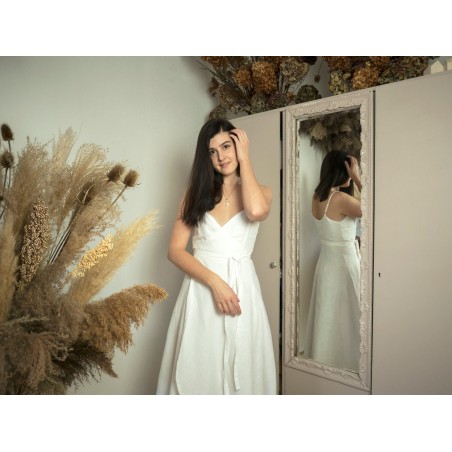 Simple white linen suspender dress