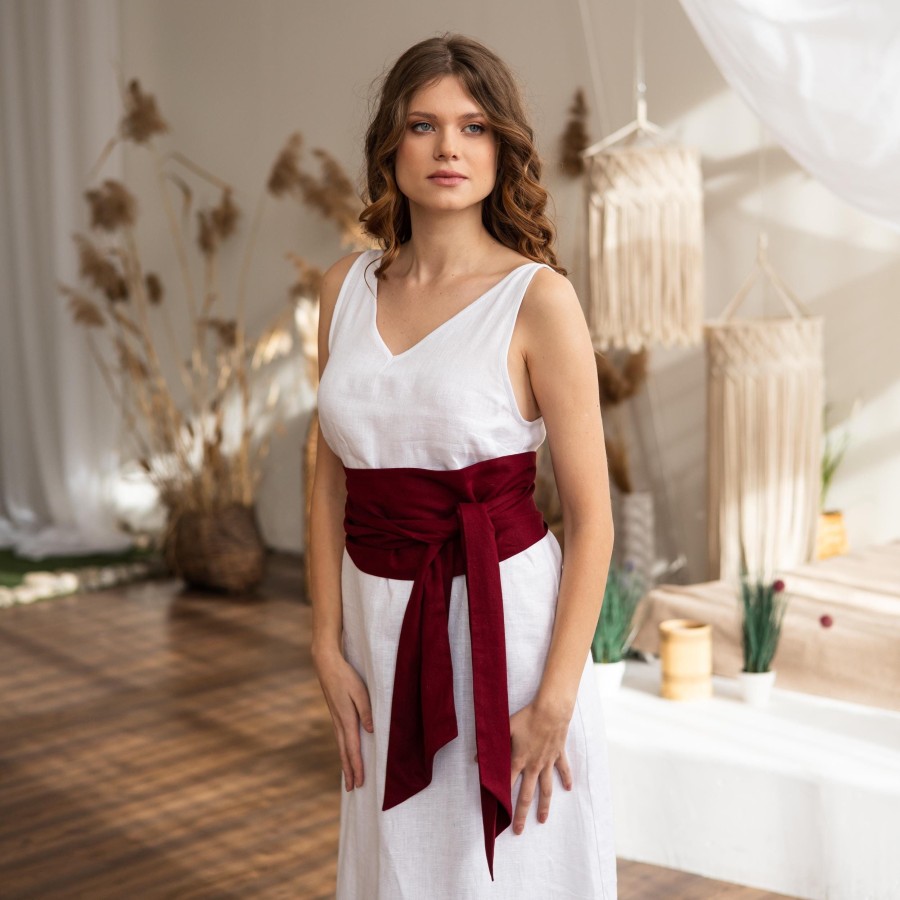White sleeveless long skirt with burgundy wide belt