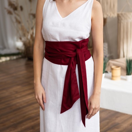 White sleeveless long skirt with burgundy wide belt