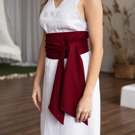 White sleeveless long skirt with burgundy wide belt