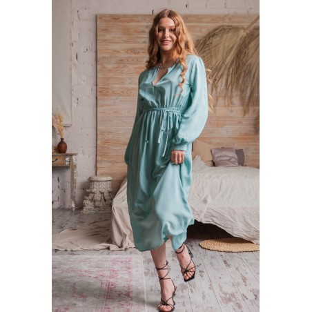 Mint green long skirt with small V-shaped opening