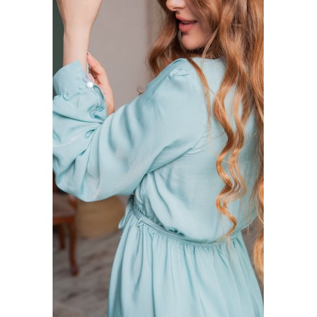 Mint green long skirt with small V-shaped opening